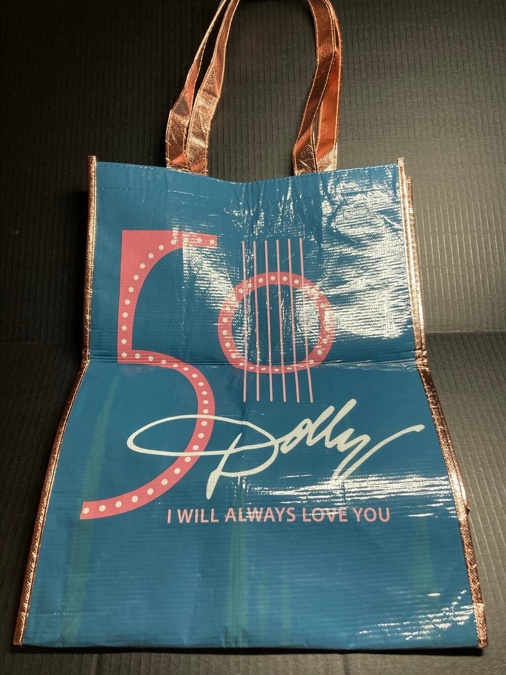 Dollywood Reusable Bag and 2 shot glasses.  Pre-Owned Great Used Condition.